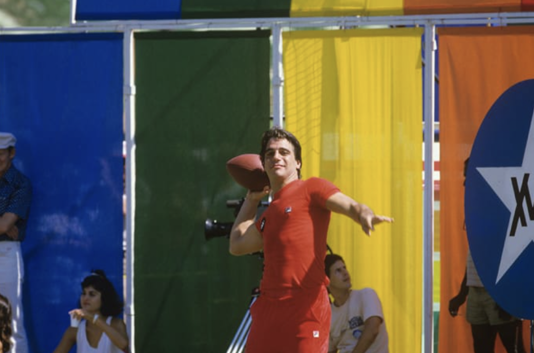 Tony Danza aims a football, 1977. 